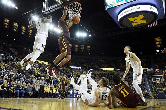Charles Matthews (1), Zavier Simpson (3), Moritz Wagner (13), and Duncan Robinson (22)