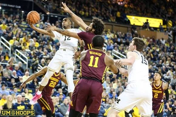 Muhammad-Ali Abdur-Rahkman (12) and Jon Teske (15)