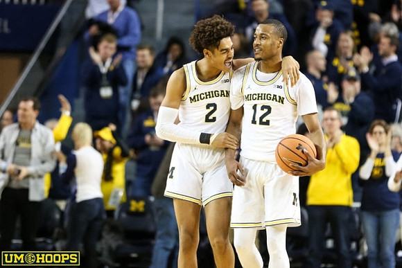 Jordan Poole (2) and Muhammad-Ali Abdur-Rahkman (12)