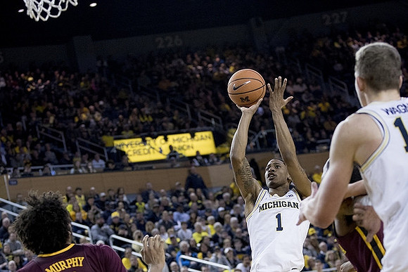 Charles Matthews (1) and Moritz Wagner (13)