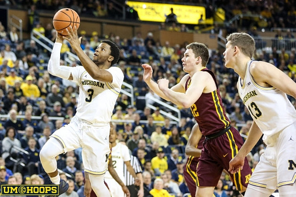 Zavier Simpson (3), Muhammad-Ali Abdur-Rahkman (12), and Moritz Wagner (13)
