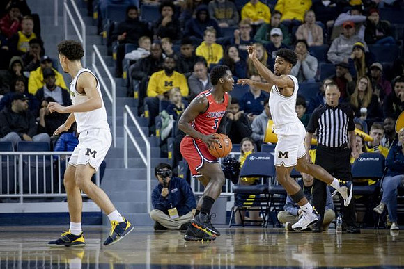 Adrien Nunez (5) and David DeJulius (0)