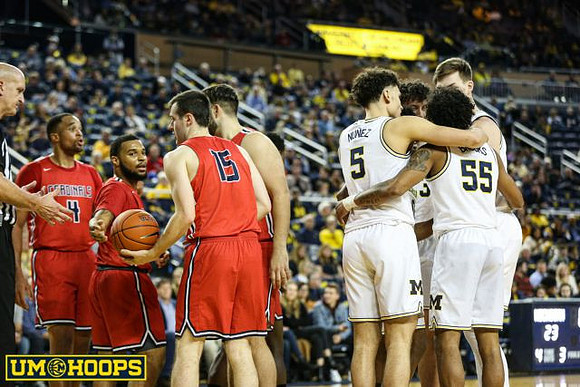 Adrien Nunez (5), Eli Brooks (55), Colin Castleton (11), and Brandon Johns Jr. (23)