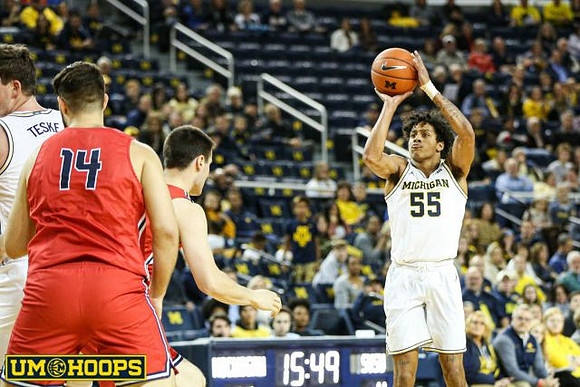 Jon Teske (15) and Eli Brooks (55)
