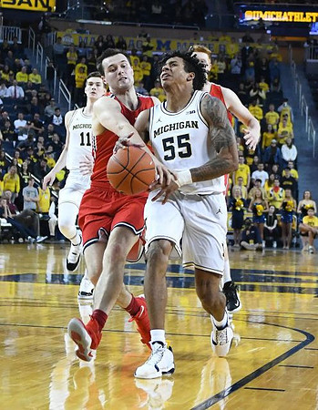 Colin Castleton (11) and Eli Brooks (55)