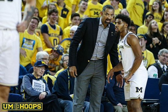 Juwan Howard and David DeJulius (0)
