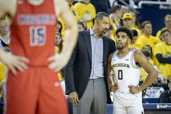 Juwan Howard and David DeJulius (0)