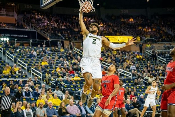 Isaiah Livers (2) and Adrien Nunez (5)