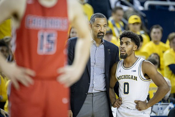 Juwan Howard and David DeJulius (0)