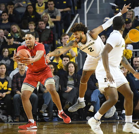 Isaiah Livers (2) and Zavier Simpson (3)