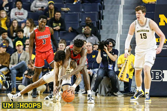 Eli Brooks (55) and Jon Teske (15)
