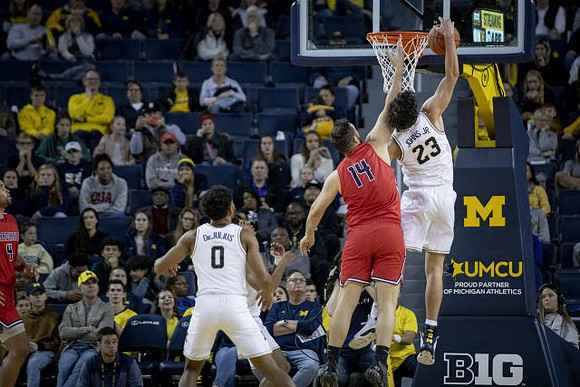 David DeJulius (0) and Brandon Johns Jr. (23)