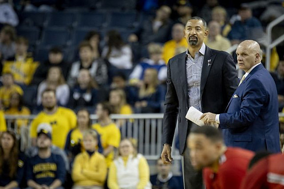 Juwan Howard and Phil Martelli