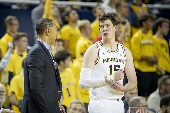 Juwan Howard and Jon Teske (15)