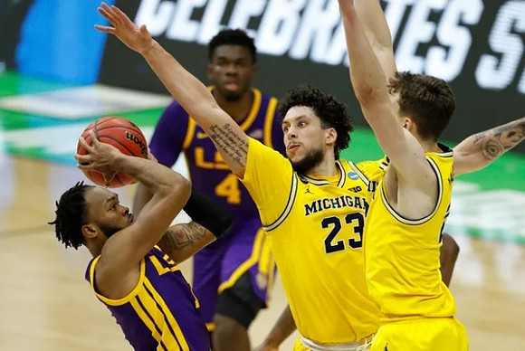 Brandon Johns Jr. (23) and Franz Wagner (21)