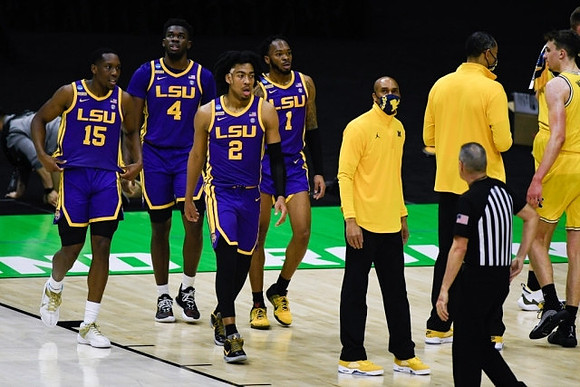 Saddi Washington, Juwan Howard, and Franz Wagner (21)