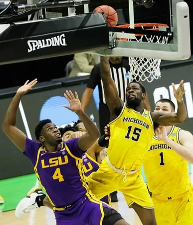Chaundee Brown Jr. (15) and Hunter Dickinson (1)
