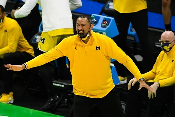 Juwan Howard and Phil Martelli