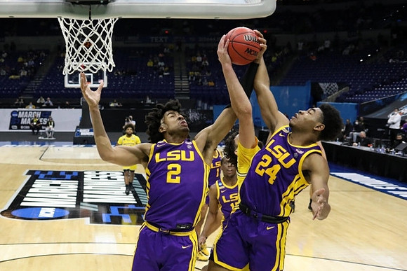 Brandon Johns Jr. (23) and Mike Smith (12)