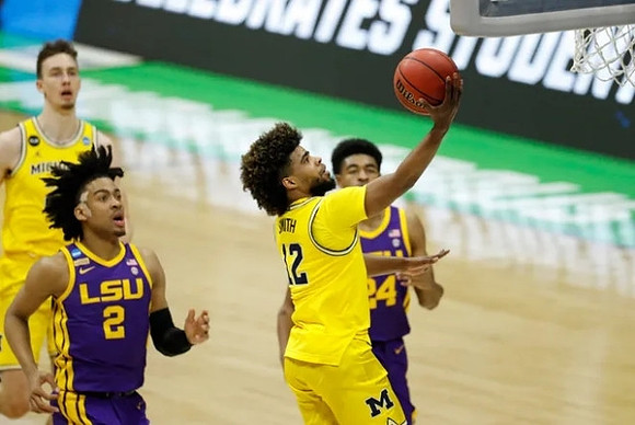 Mike Smith (12) and Franz Wagner (21)