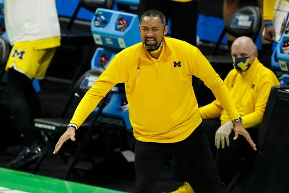 Juwan Howard and Phil Martelli