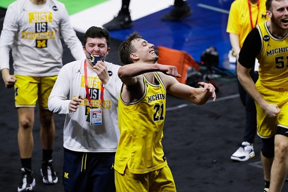 C.J. Baird (24), Franz Wagner (21), and Austin Davis (51)