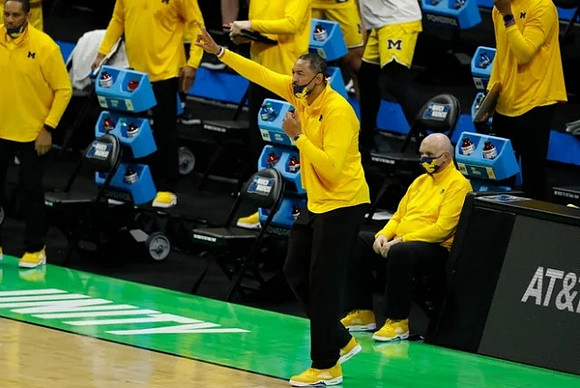Juwan Howard and Phil Martelli
