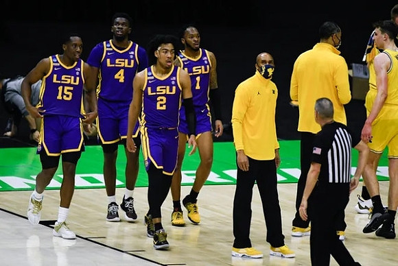 Saddi Washington, Juwan Howard, and Franz Wagner (21)