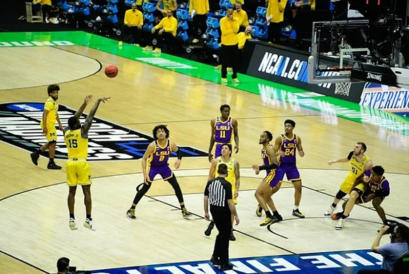 Mike Smith (12), Chaundee Brown Jr. (15), Eli Brooks (55), and Austin Davis (51)