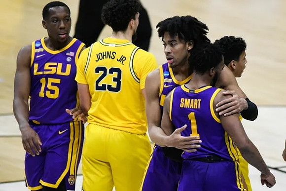 Brandon Johns Jr. (23) and Eli Brooks (55)