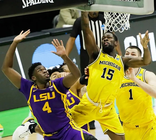 Chaundee Brown Jr. (15) and Hunter Dickinson (1)