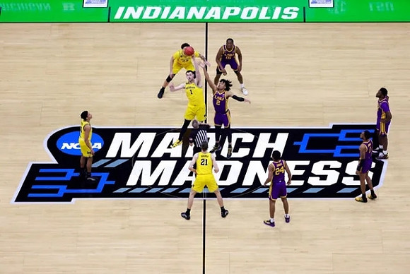Eli Brooks (55), Franz Wagner (21), Hunter Dickinson (1), and Brandon Johns Jr. (23)