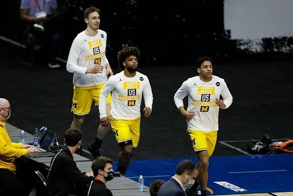 Franz Wagner (21), Mike Smith (12), and Eli Brooks (55)
