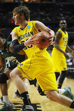 Evan Smotrycz (23) and Tim Hardaway Jr. (10)