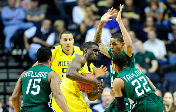 Jordan Morgan (52) and Tim Hardaway Jr. (10)