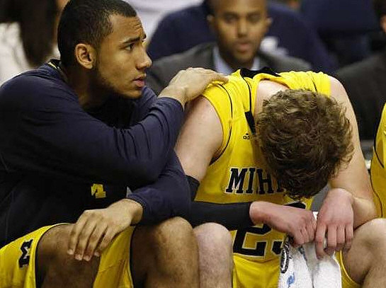 Jon Horford (15) and Evan Smotrycz (23)