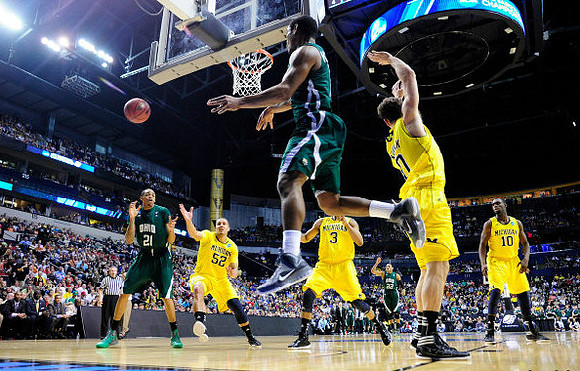 Jordan Morgan (52), Trey Burke (3), Zack Novak (0), and Tim Hardaway Jr. (10)