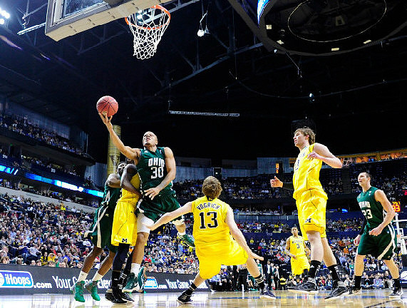Tim Hardaway Jr. (10), Matt Vogrich (13), Trey Burke (3), and Evan Smotrycz (23)