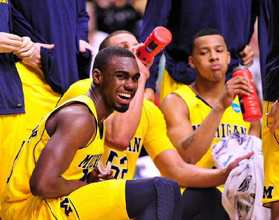 Tim Hardaway Jr. (10), Jordan Morgan (52), and Trey Burke (3)