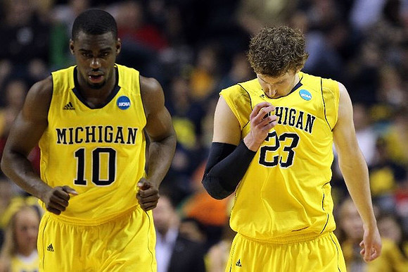 Tim Hardaway Jr. (10) and Evan Smotrycz (23)