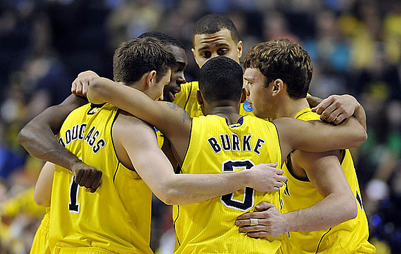 Stu Douglass (1), Tim Hardaway Jr. (10), Jordan Morgan (52), Trey Burke (3), and Zack Novak (0)