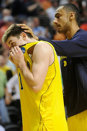 Stu Douglass (1) and Jon Horford (15)