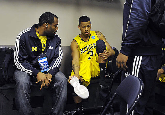 Eso Akunne (5) and Trey Burke (3)