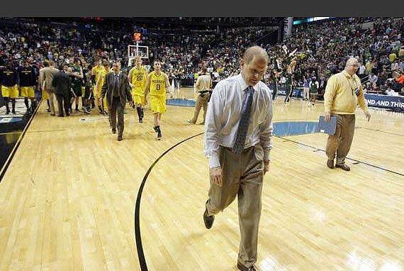 Jeff Meyer, Blake McLimans (22), Zack Novak (0), and John Beilein