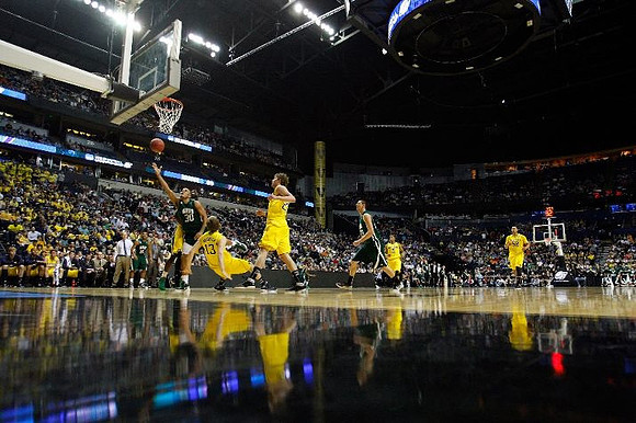 Tim Hardaway Jr. (10), Matt Vogrich (13), Evan Smotrycz (23), Trey Burke (3), and Jordan Morgan (52)