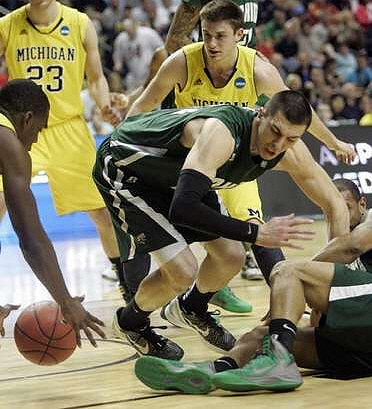 Evan Smotrycz (23) and Stu Douglass (1)