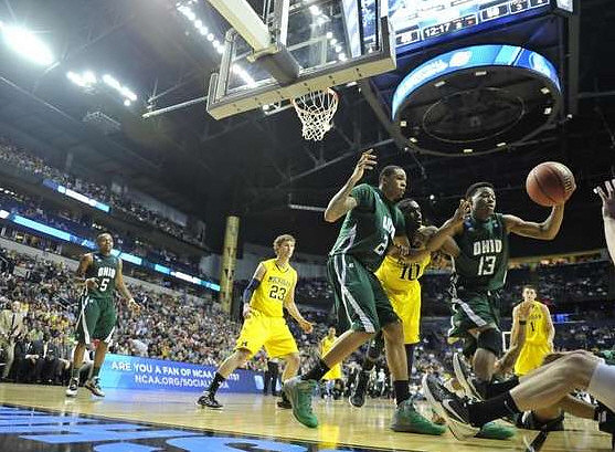 Evan Smotrycz (23), Tim Hardaway Jr. (10), and Stu Douglass (1)
