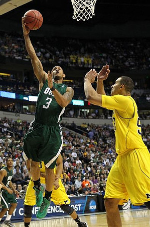 Trey Burke (3) and Jordan Morgan (52)