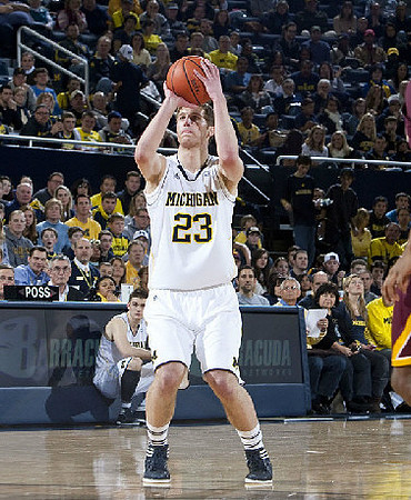 Evan Smotrycz (23) and Stu Douglass (1)