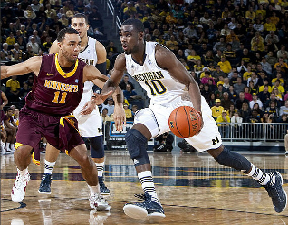 Jordan Morgan (52) and Tim Hardaway Jr. (10)